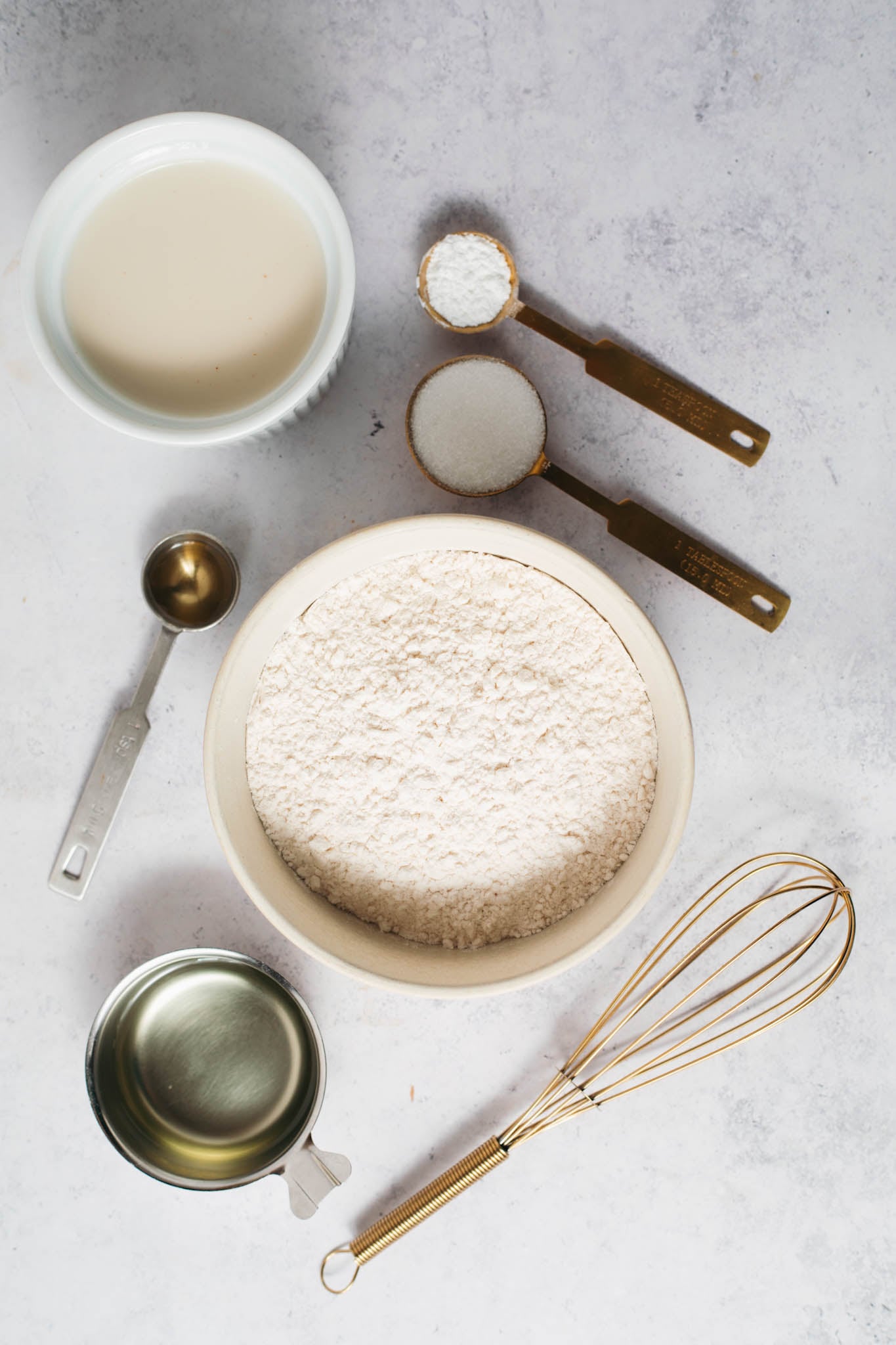 overhead view of ingredients for fluffy buttermilk pancakes