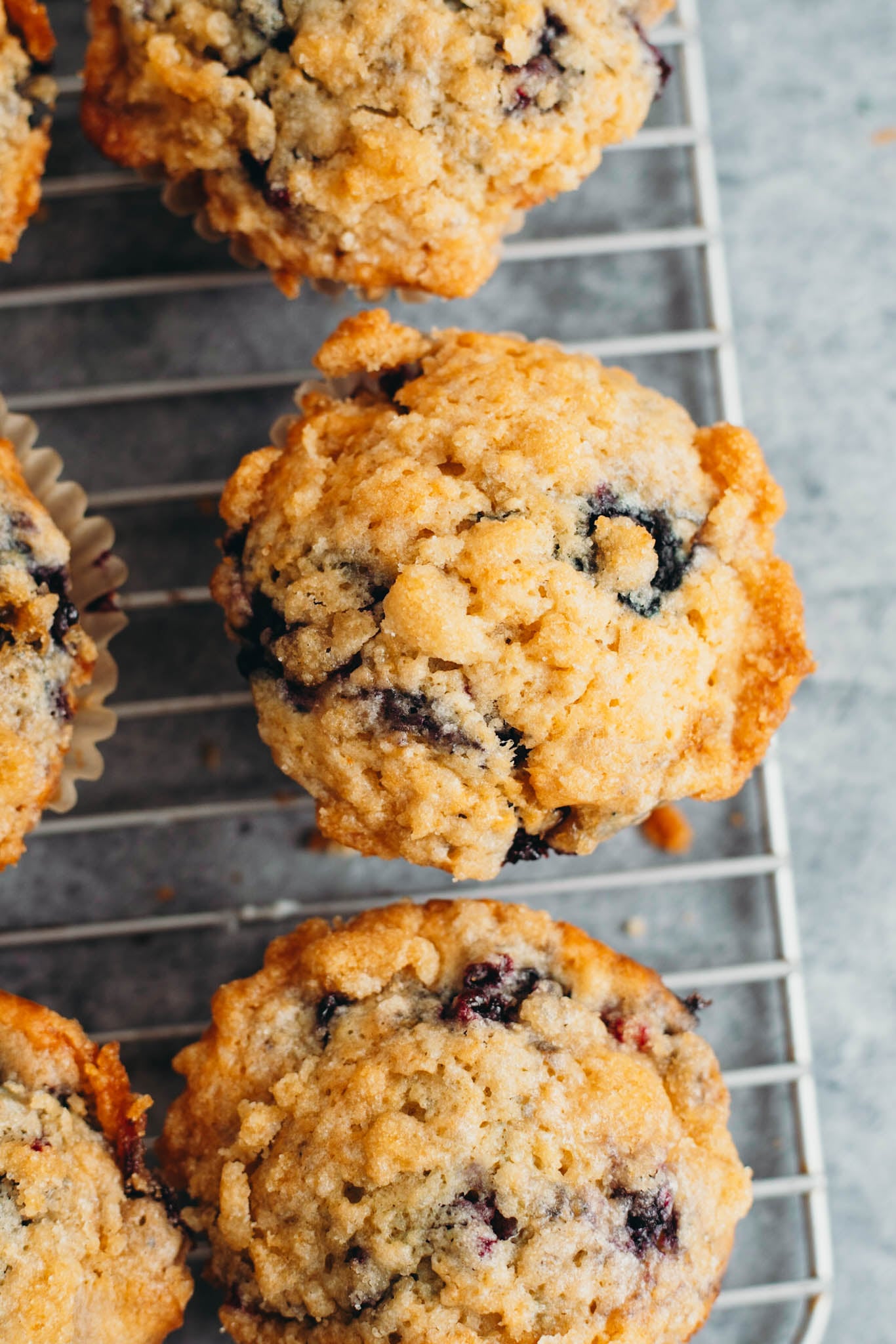 close up shot of vegan blueberry muffins with crumble topping
