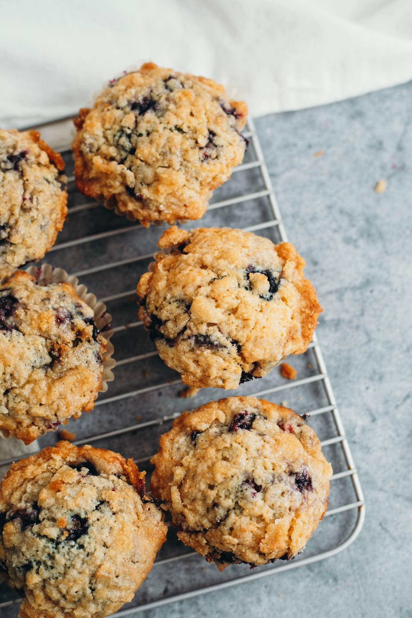 blueberry muffins on a cooling rack