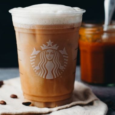 starbucks takeout cup with pumpkin cream cold brew coffee drink