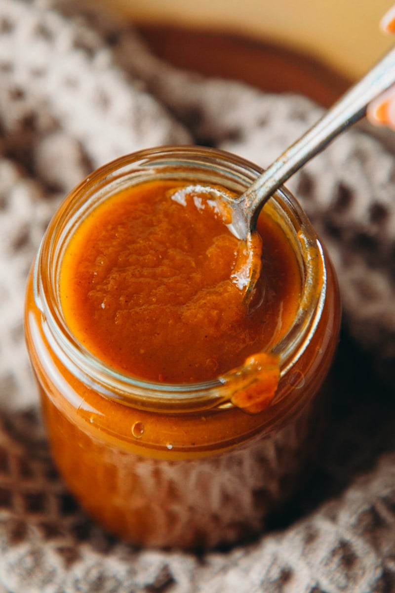 photo of a top down view of pumpkin spice sauce syrup in a jar