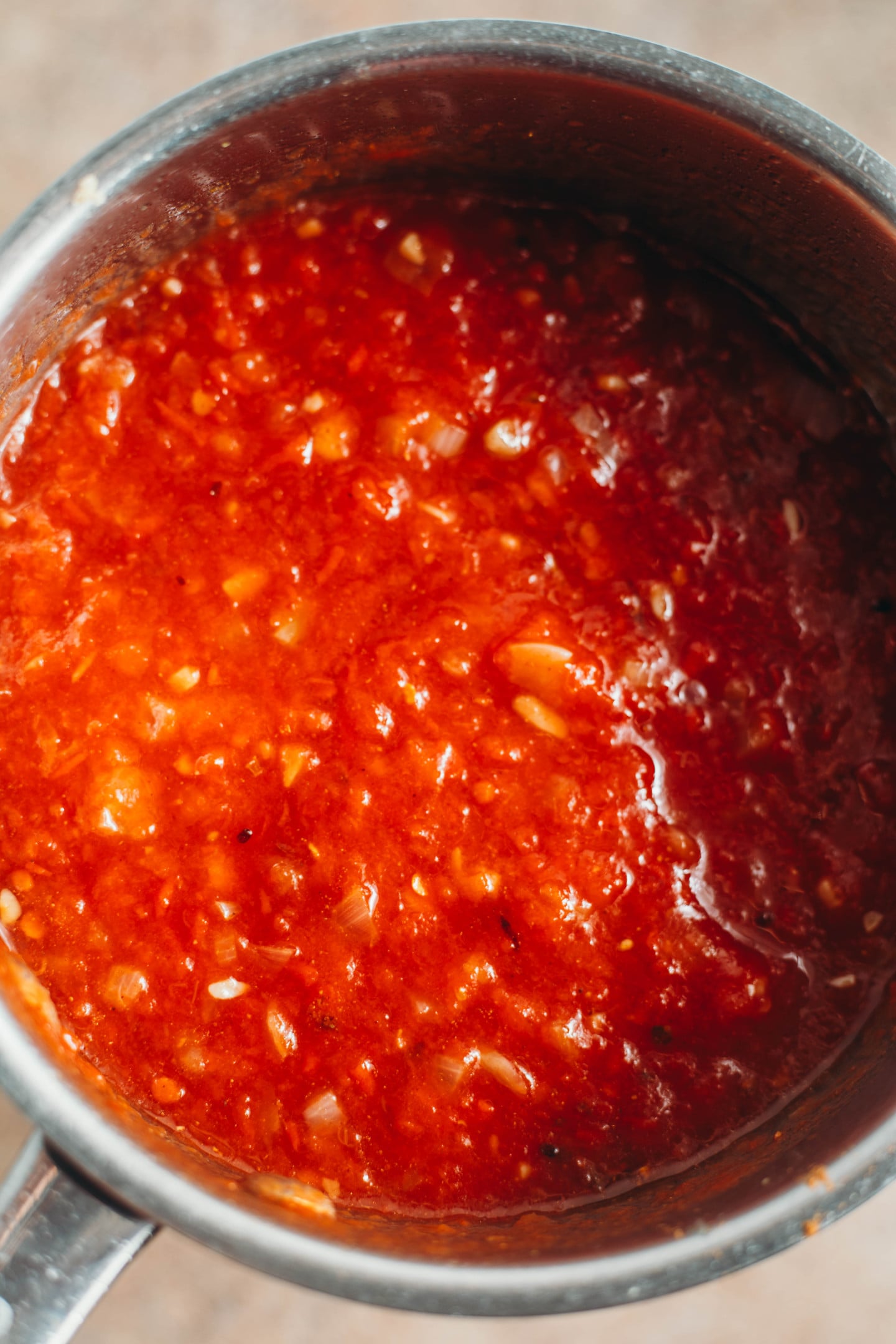 overhead view of tomato jam before being cooked down.